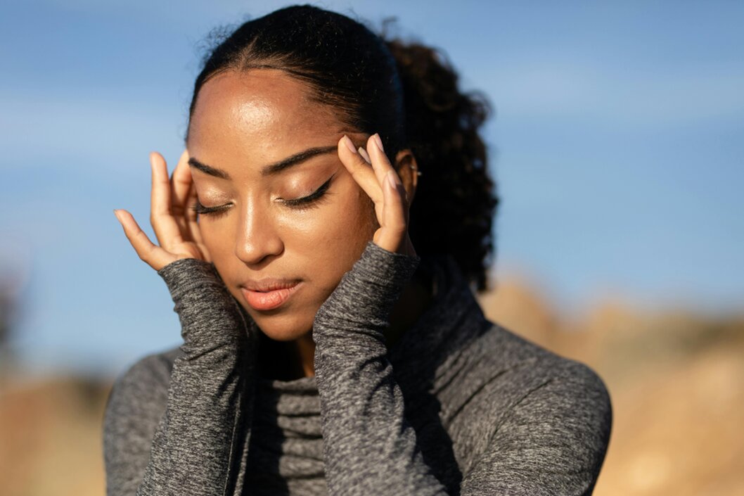 Client practising calming breathing techniques during hypnotherapy