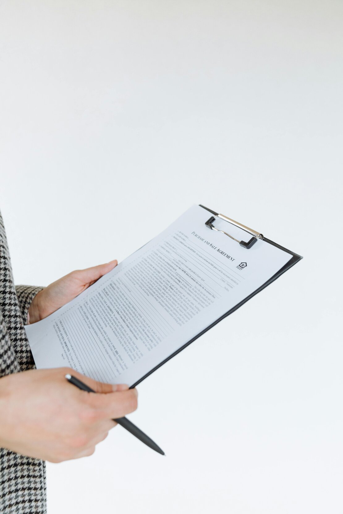 Clinician completing an assessment checklist